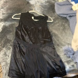 Silk peplum top. Zips on side. Lightly worn. 1 snag on bottom left hem.